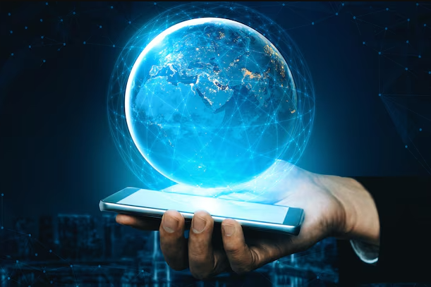 Business owner using mobile-friendly responsive website on laptop and phone.